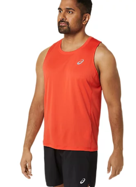 Person wearing a red Asics Men's Silver Singlet with grey shorts
