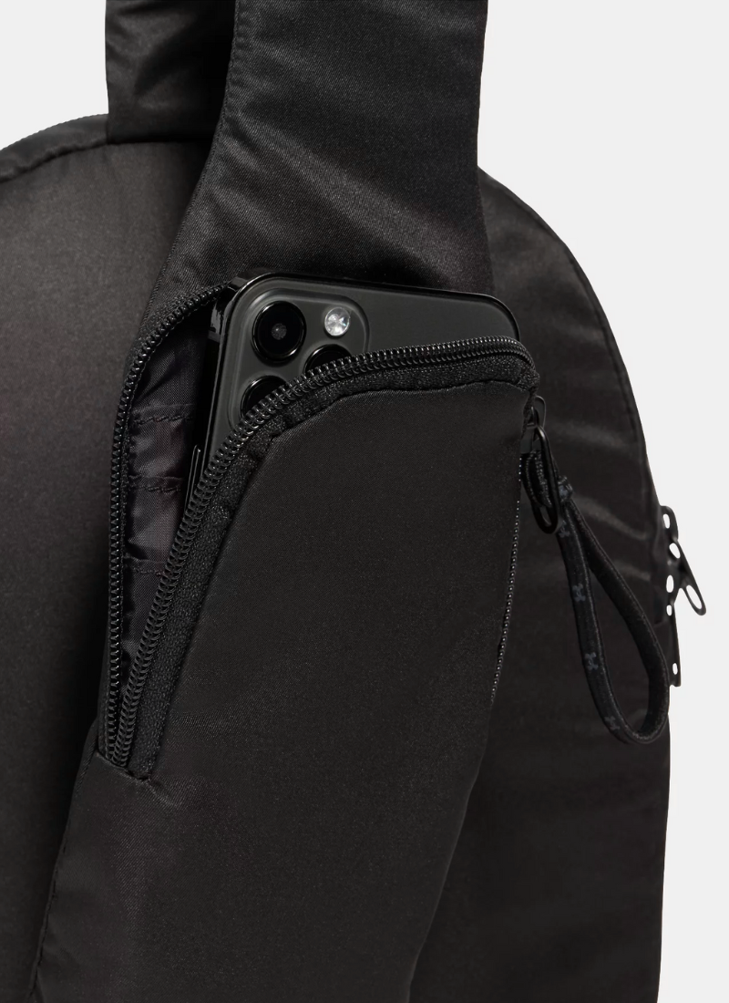 Black backpack with a zipper pocket on a white background