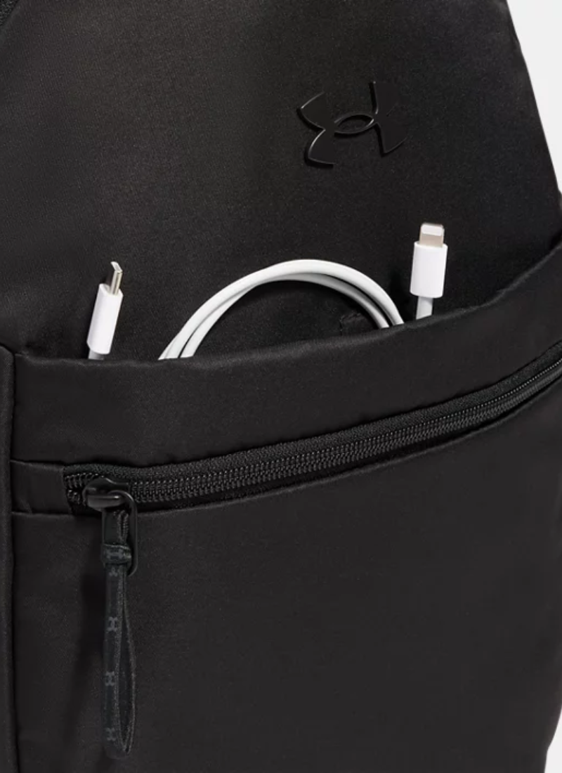 Black backpack with a visible brand logo, open to reveal white cables inside.