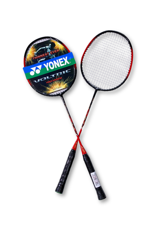 Two crossed Yonex Voltric red and black badminton rackets.