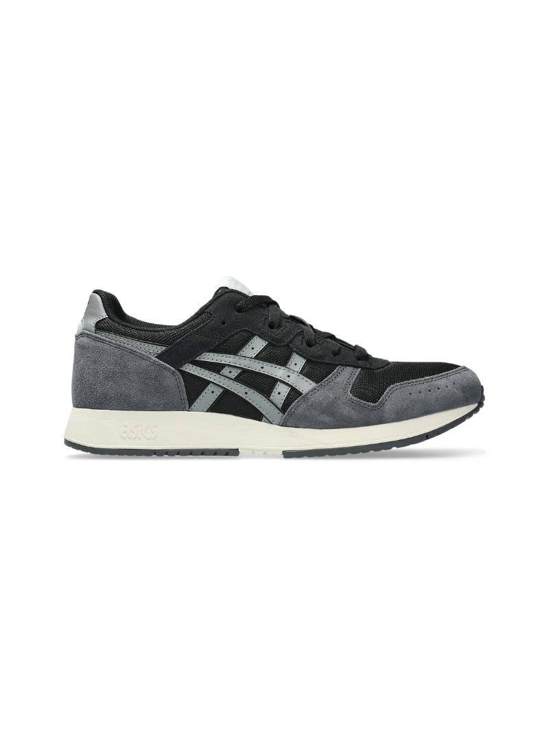 Medial side profile view of the Asics Lyte Classic Sneaker showcasing the inner dark mesh construction, grey suede heel counter, and debossed Asics logo on the heel midsole.