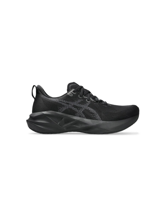 Inner medial side profile view of the Asics Novablast 5 Running Shoe displaying the breathable black mesh upper, dark grey stripe graphics, and geometric midsole geometry.