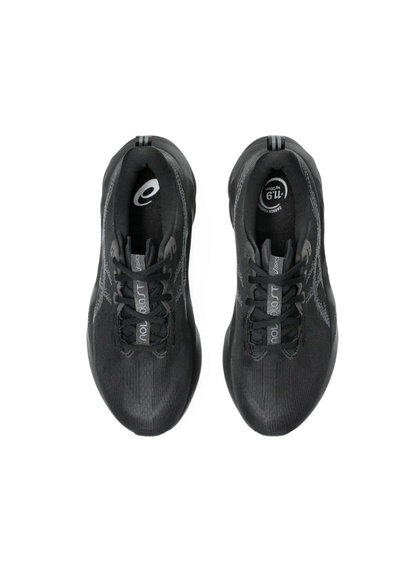 Overhead top-down view of the Asics Novablast 5 Running Shoes showcasing the black mesh toe box, black laces, grey "NOVABLAST" printed tongue tabs, and dark insoles.