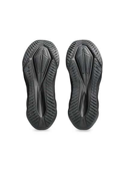 Underside bottom view of the Asics Novablast 5 Running Shoe outsoles showing a black AHAR rubber tread pattern with a central trampoline-inspired pod design.