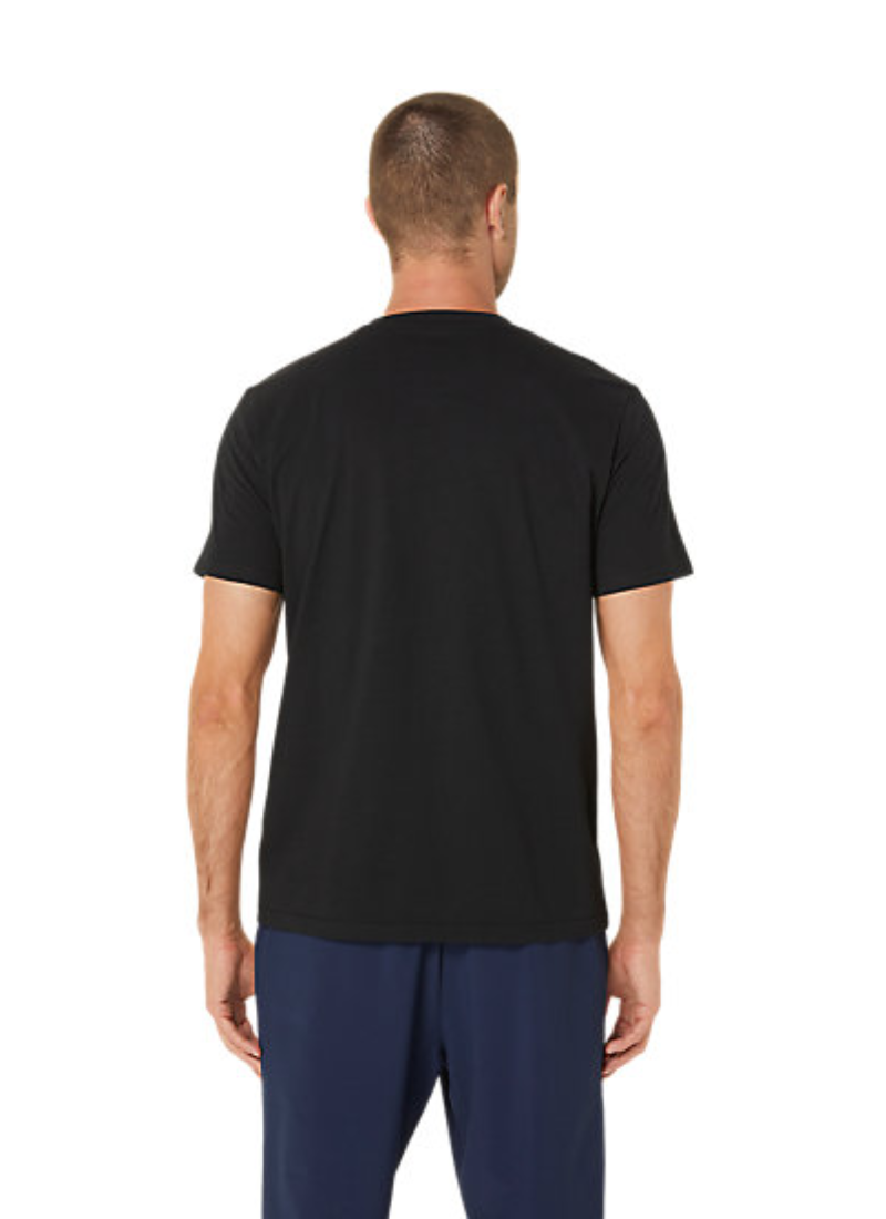 Man wearing a black t-shirt with a white Asics logo on a white background, rear view