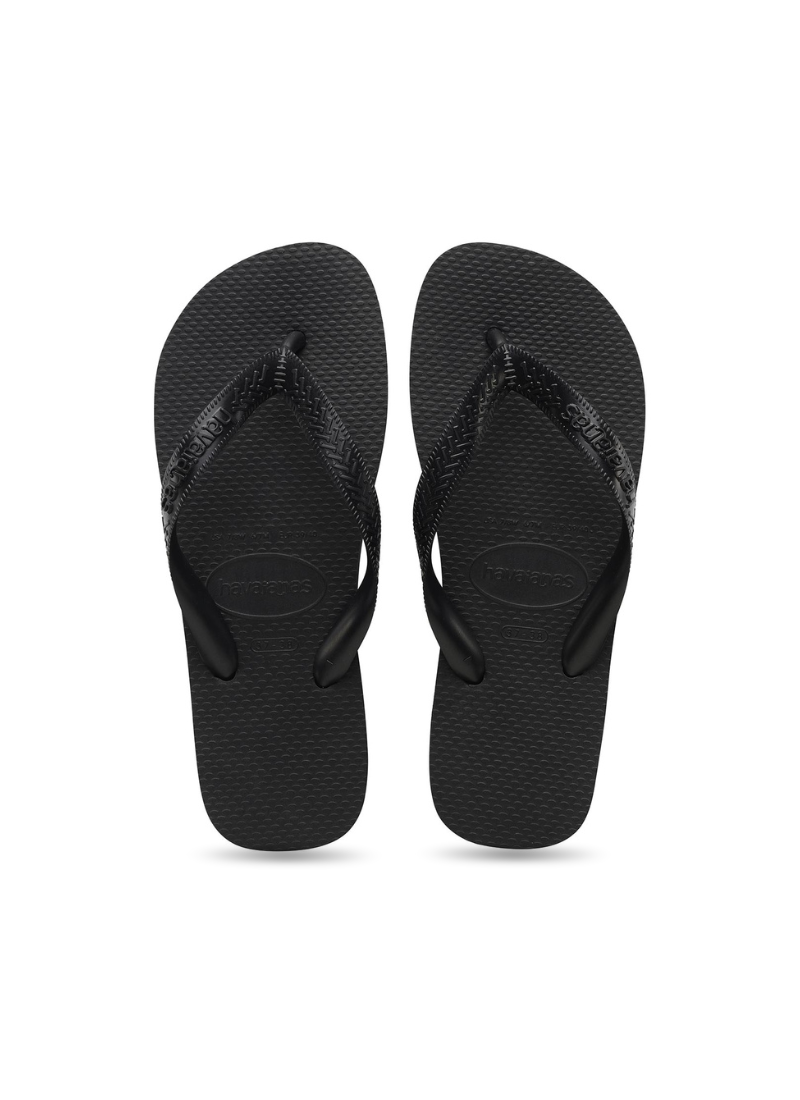 top view of a pair of back havaianas top flip flops on a white background