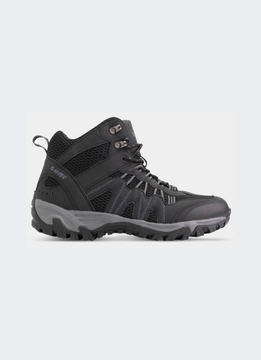 Black hiking boot on a light gray background