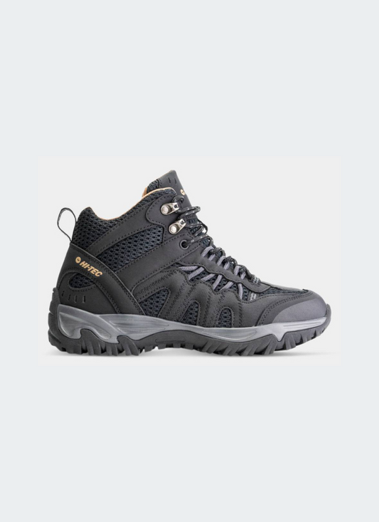 Black women's hiking boot on a light gray background