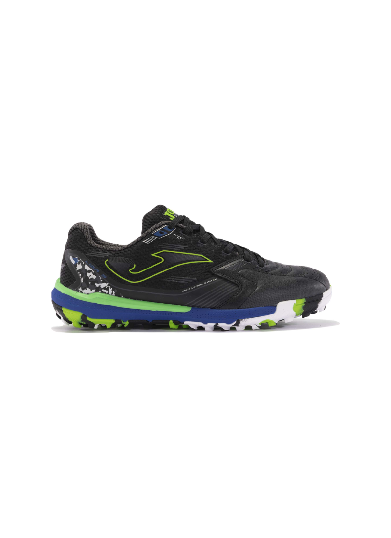 Joma Liga 5 men's turf football boots side view showing black synthetic upper, Joma branding, lime green logo detail, royal blue midsole, and camo-print heel panel