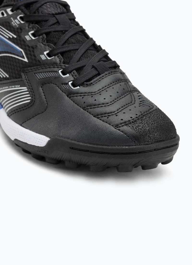 Close-up of Joma Liga 5 men's turf football boots showing perforated synthetic toe box, Protection rubber reinforcement, and multi-stud outsole