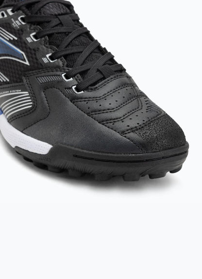 Close-up of Joma Liga 5 men's turf football boots showing perforated synthetic toe box, Protection rubber reinforcement, and multi-stud outsole