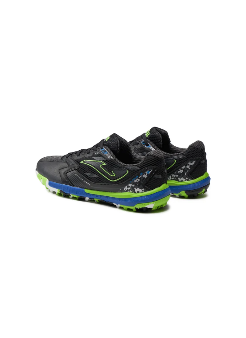 Joma Liga 5 men's turf football boots pair shown from angled rear view highlighting royal blue midsole, lime green outsole accents, and camo-print heel panel