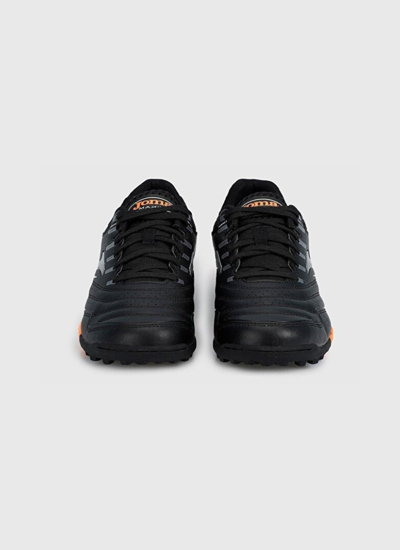 Direct front view of the pair of Joma Maxima 2301 turf football shoes highlighting the stitched black toe caps, black laces, and orange Joma logos on the tongues.