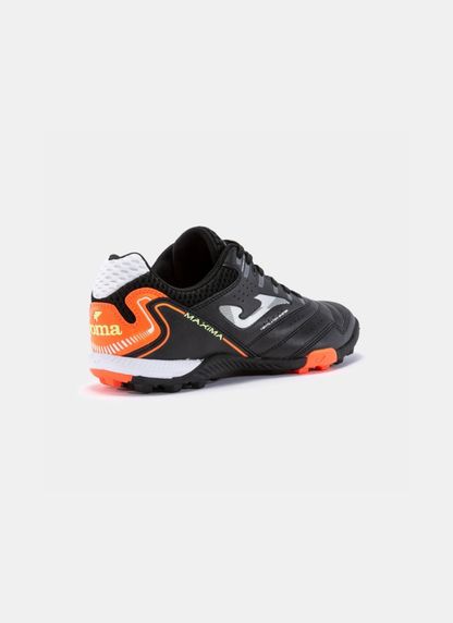 Three-quarter rear view of the Joma Maxima 2301 turf shoe displaying the black mesh ankle collar, orange heel counter graphics, and white heel collar accent.