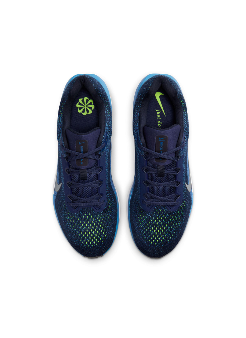 Top-down view of a pair of Nike Winflo 11 running shoes in navy blue, highlighting the lace-up system, tongue branding, and neon green interior sockliners.