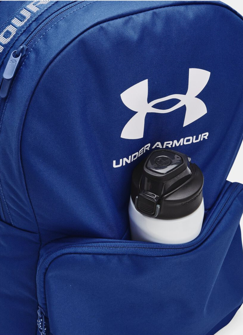 Blue Under Armour backpack with a water bottle in the pocket