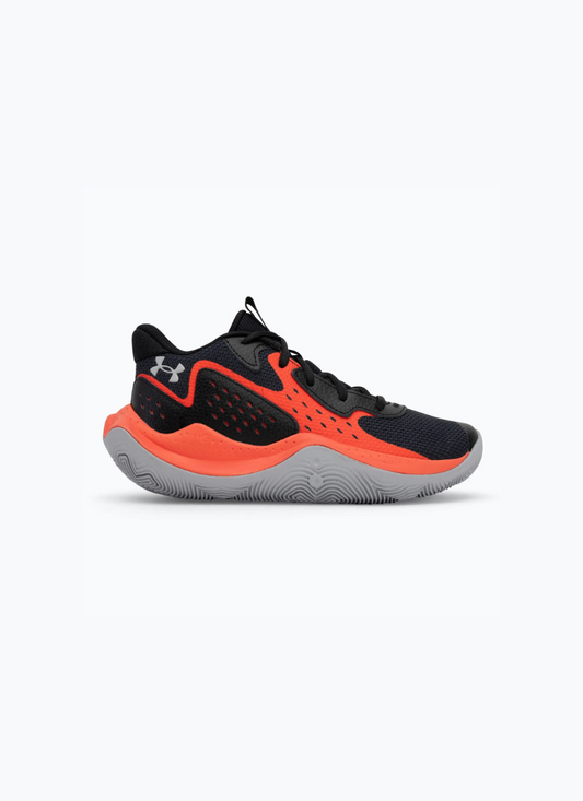 Black and orange Under Armour Under Armour GS Jet '23 Kids sneaker on a white background