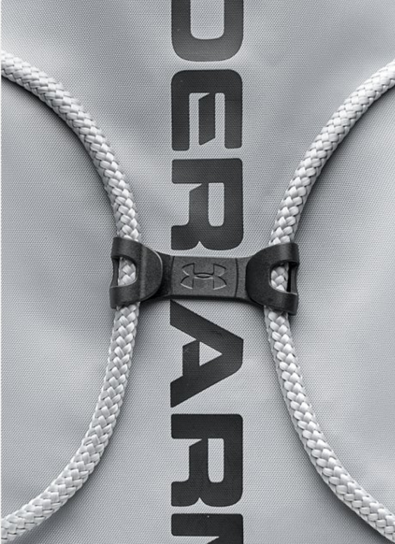 Gray bag with white ropes and 'Under Armour' branding