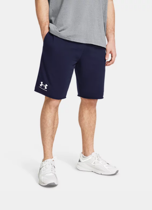 Person wearing navy Under Armour shorts on a white background