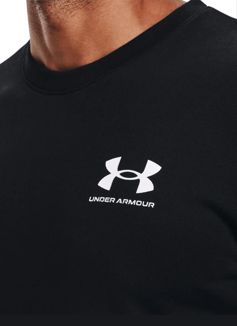 Black Under Armour t-shirt with logo on a person wearing it