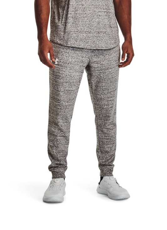 Person wearing gray heathered jogger pants and a matching top on a white background