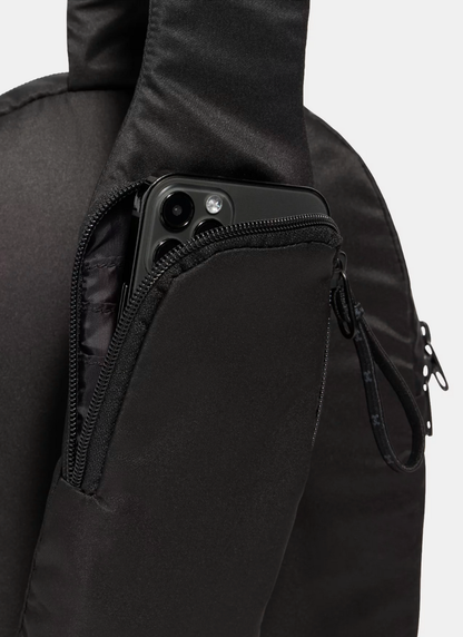 Black backpack with a zipper pocket on a white background