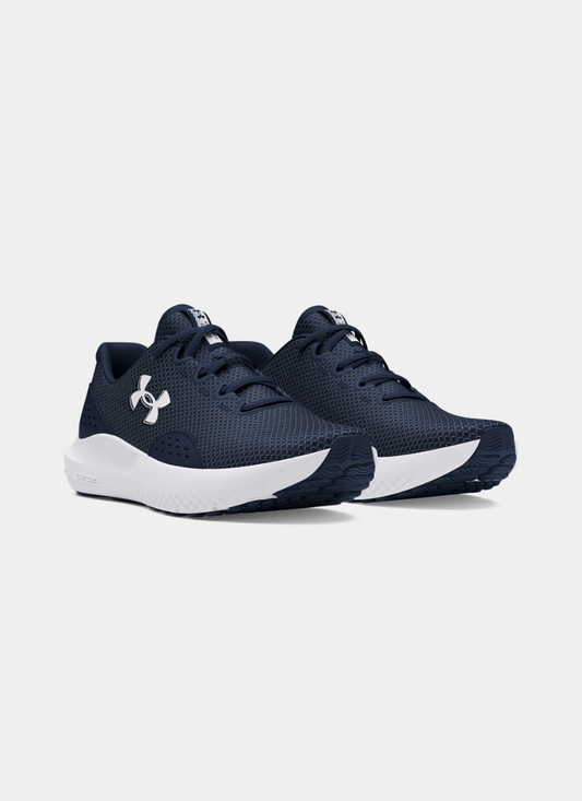 Navy and white sneakers with a brand logo on a light gray background