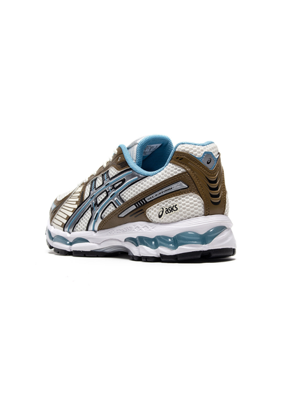 Asics Gel-Kayano 12.1 Cream/Stillwater sneaker, rear angled view showing heel construction and ASICS branding.