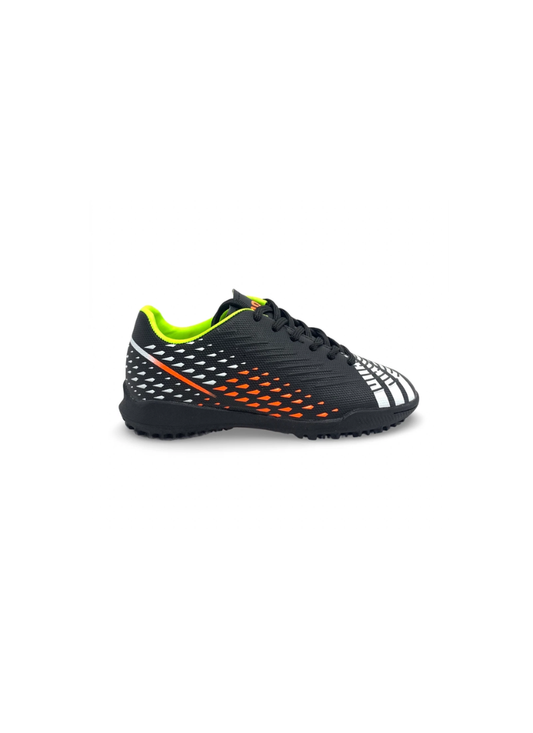 Side view of a black kids' turf football shoe with white and orange accents, lime green collar and orange midsole panel